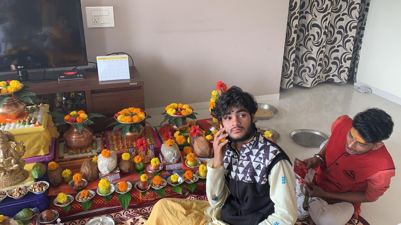 Pandit Ji preparing sacred materials for puja
